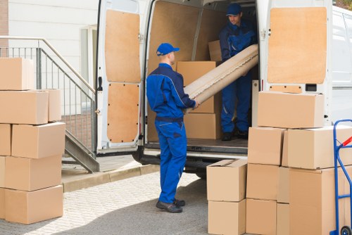 Man with a van loading boxes in Palmers Green