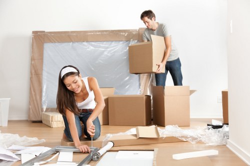 Office relocation planning in Palmers Green with business moving boxes and equipment