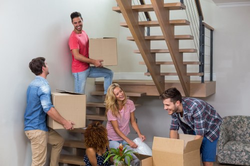 Moving van and packed boxes for removals in Palmers Green