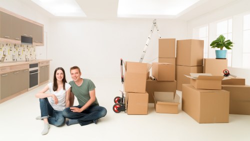 Furniture and boxes being loaded for a Palmers Green move