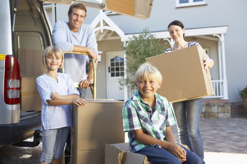 Loading household items into a removals van in Palmers Green