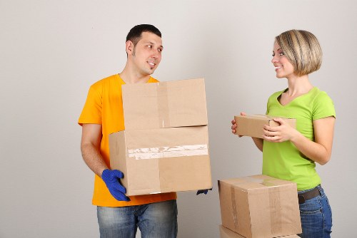 Loading household furniture into a removal van in Palmers Green