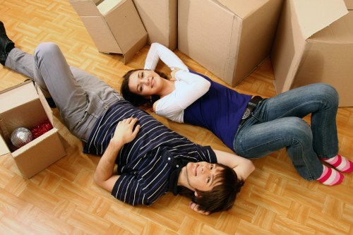 Packed office boxes and furniture ready for transport